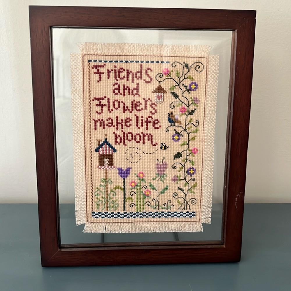 Cross-stitch in floating frame